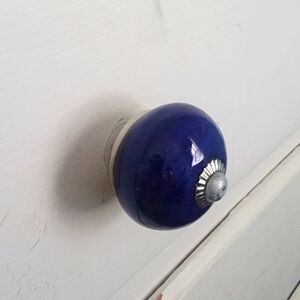 (4) Ceramic cabinet knobs or drawer pulls